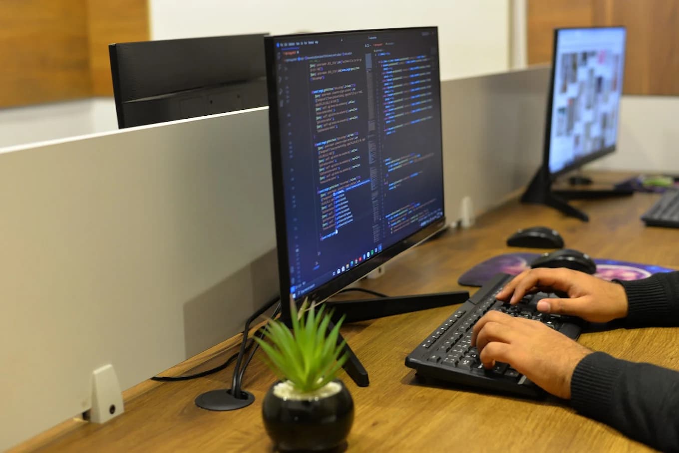 Developer coding at Eclipse Agency office